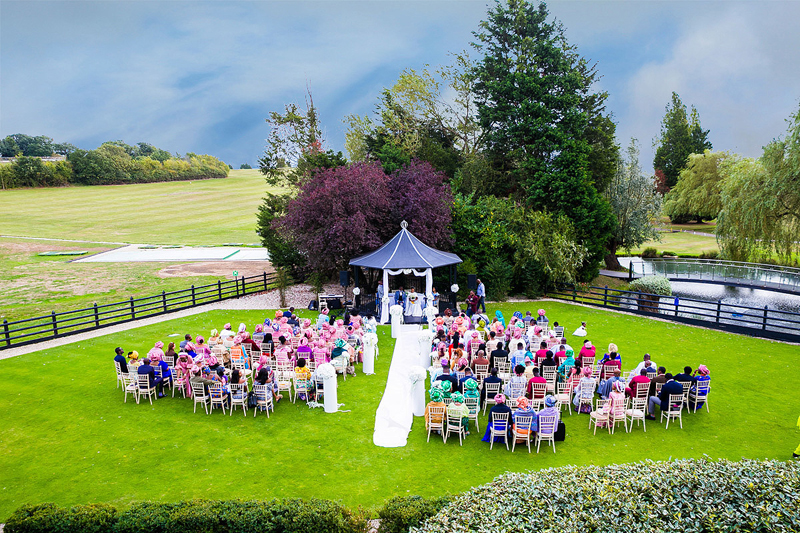 Outdoor view of a wedding ceremony at Three Rivers